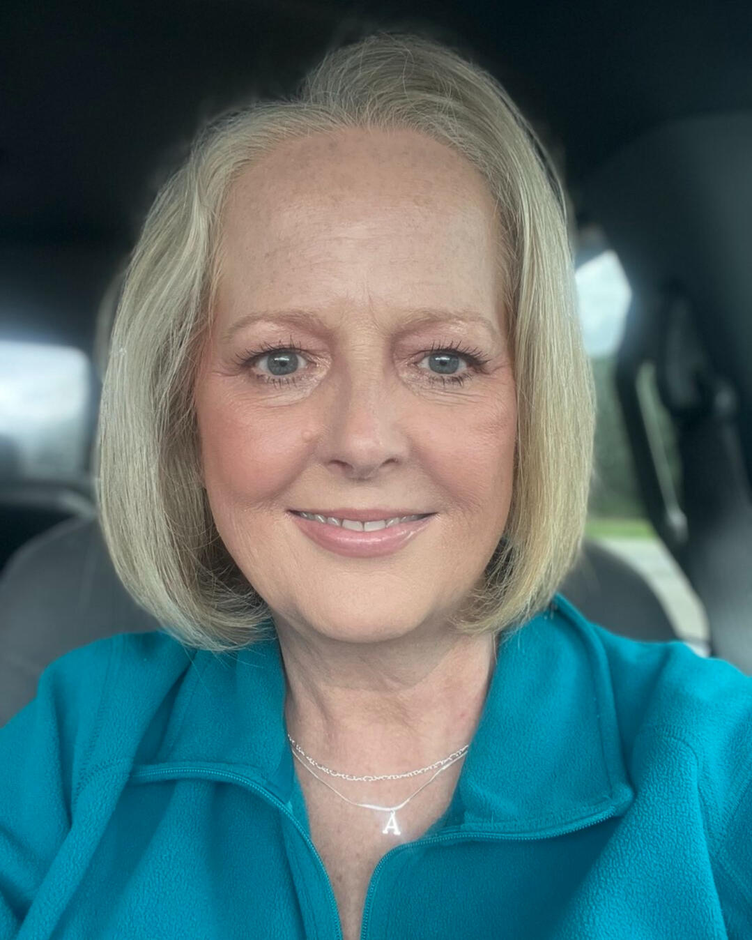 Ann Keller UGC Gen X Ann Keller UGC Gen X in a blue top sitting in her car.