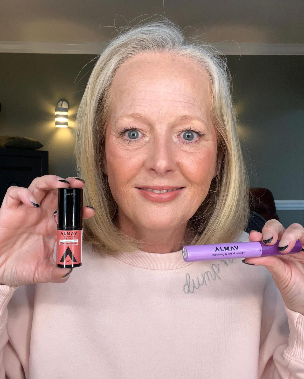 Ann Keller UGC - holding UGC Almay Color & Care Tint Stick and the Almay Thickening &Tint Mascara for a UGC Instagram Post Ann Keller UGC - holding UGC Almay Color & Care Tint Stick and the Almay Thickening &Tint Mascara for a UGC Instagram Post